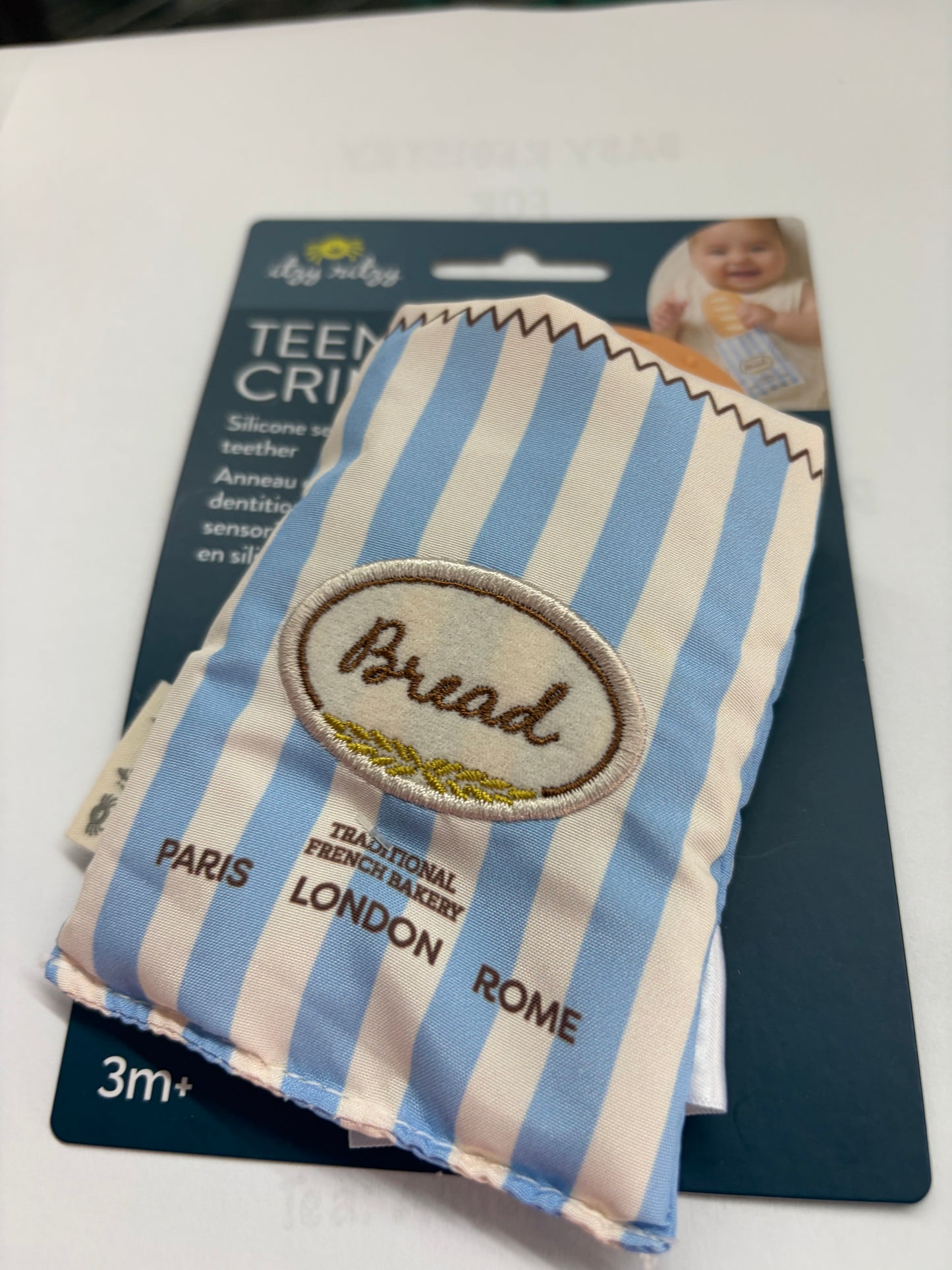Teethers,bibs, burps and dishes-Norris
