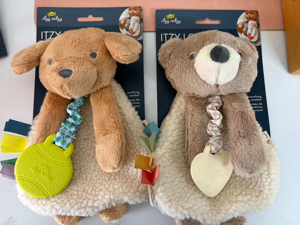 Paci, toys and Teethers-Junkins